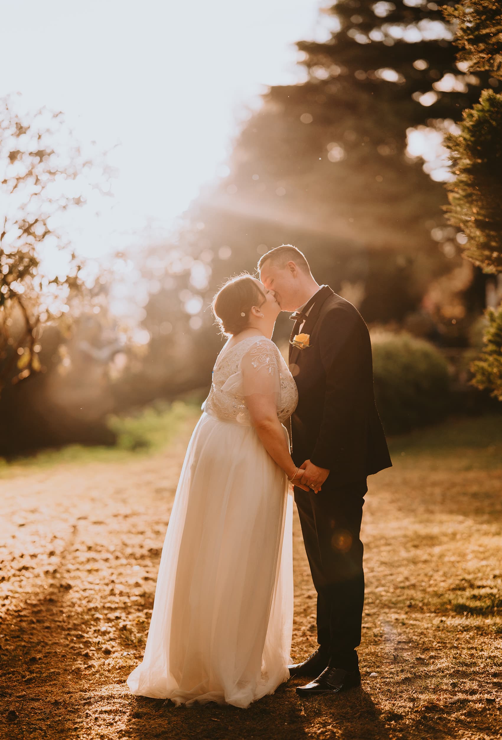 Bride and groom golden hour portrait